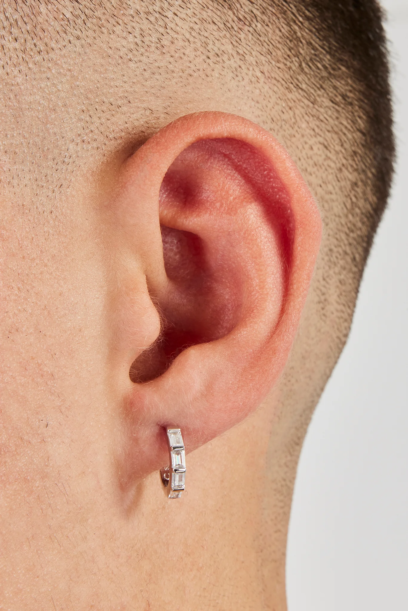 Iced Baguette Stone Huggie Earrings - 10mm - Image 3